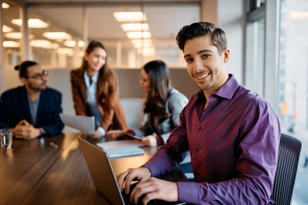 Smiling IT provider working on an IT roadmap for a client